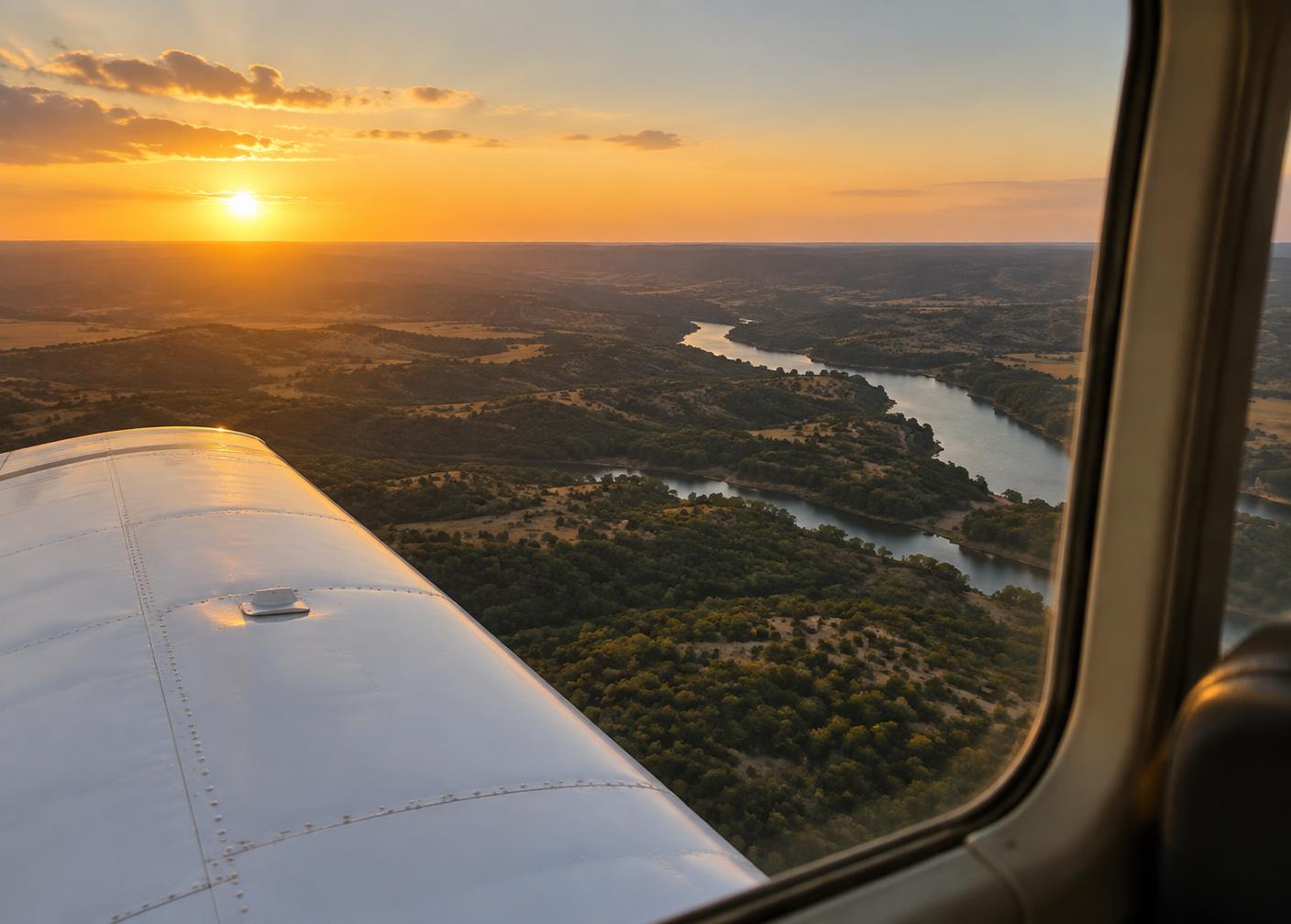 Wing over Texas Hill Country at sunset